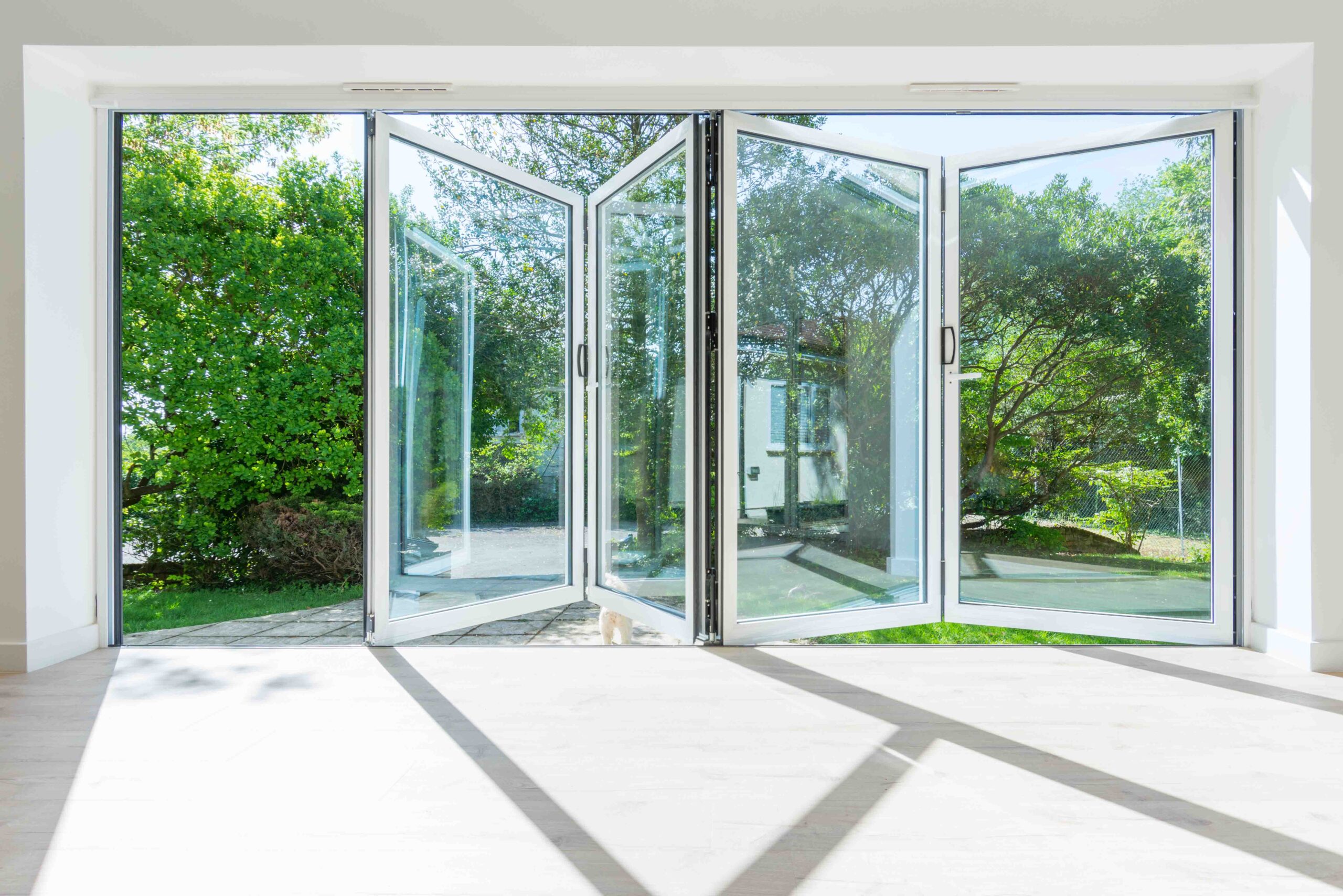 Extensive glass doors, connecting indoor space.
