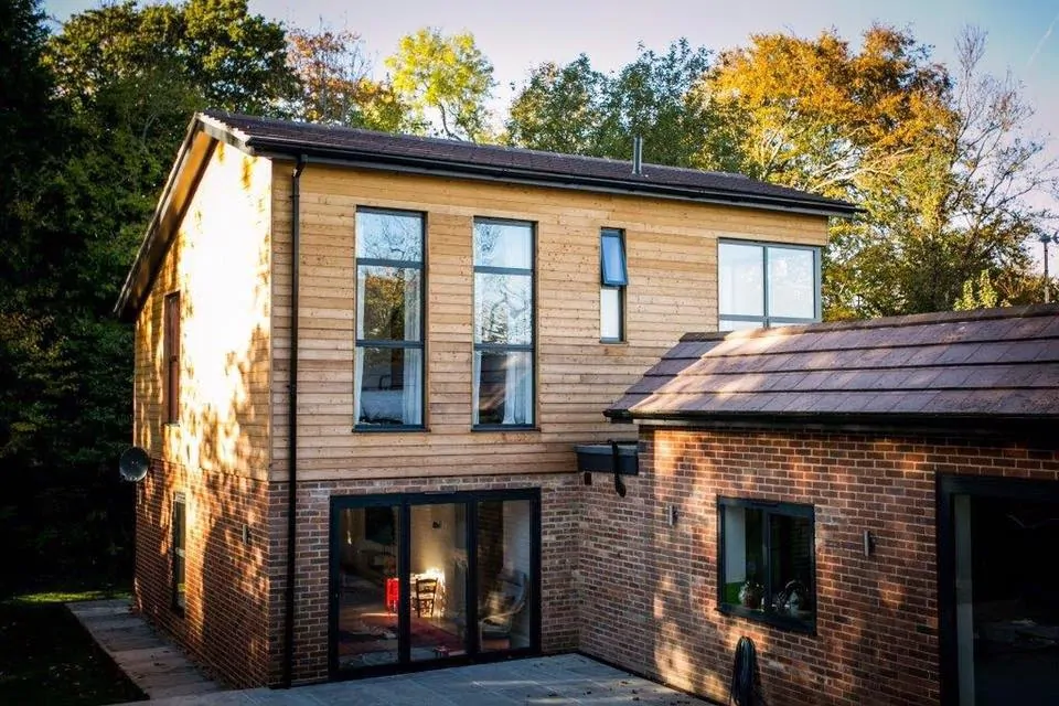 Smart glass skylight installed in eco-friendly office building design.