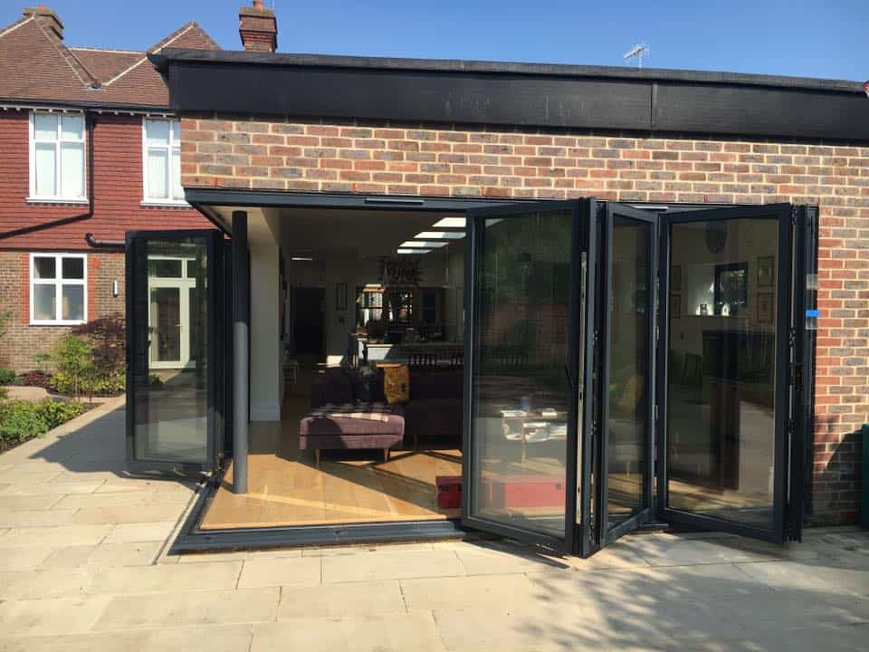 Another glass extension with outdoor seating.