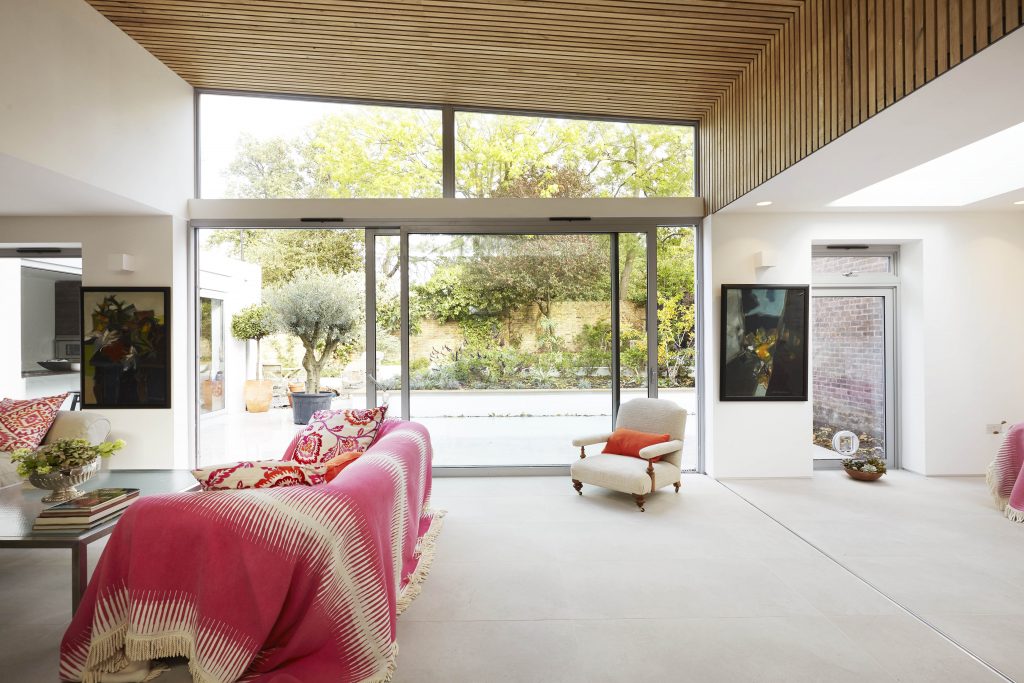 Bright living room with large windows.