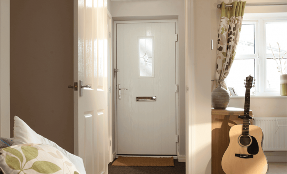 40.01-composite-door-frost-white Interior hallway features a white door and guitar display.