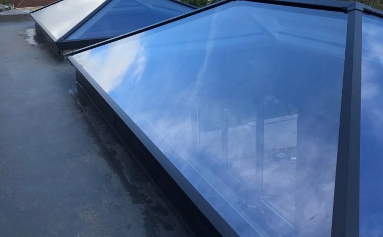 Glass roof installation by Bowalker offering clear sky views and natural light