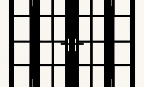Heritage Black French doors with 12 small panes each and silver handles.
