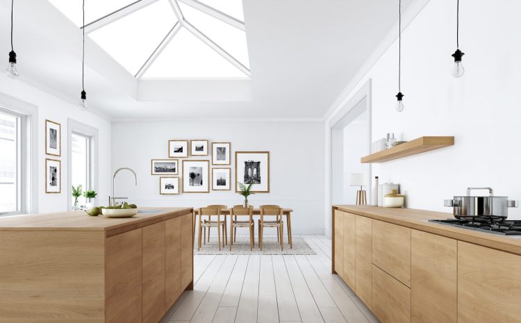 Lantern roof light over kitchen island flooding space with natural light